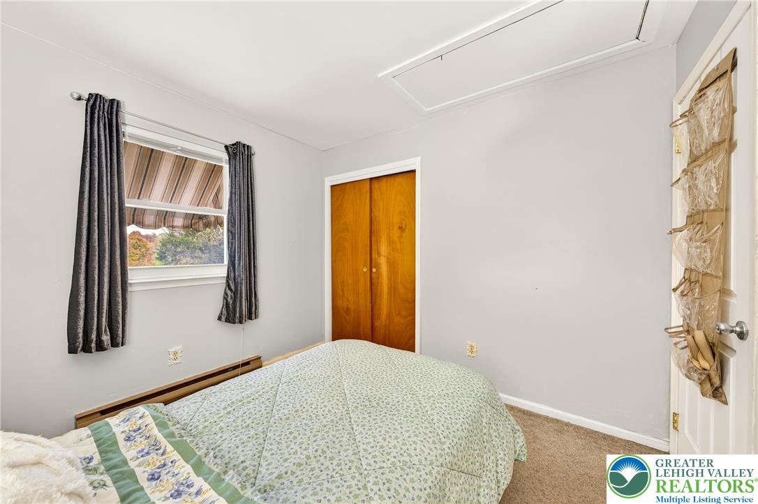 849 Weil Street Bethlehem, PA 18015 - Photo 27 of 58 a bedroom with a bed and a window