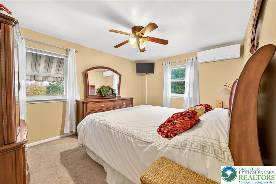 849 Weil Street Bethlehem, PA 18015 - Photo 28 of 58 a bedroom with a bed and a large window