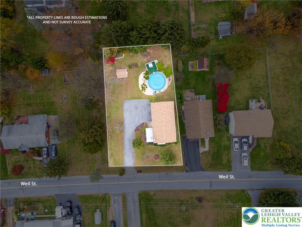 849 Weil Street Bethlehem, PA 18015 - Photo 3 of 58 an aerial view of house with yard swimming pool and outdoor seating