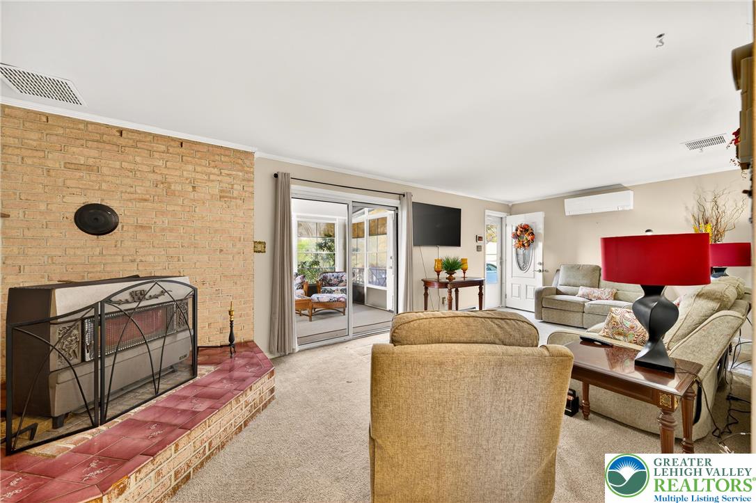 849 Weil Street Bethlehem, PA 18015 - Photo 37 of 58 a living room with furniture and a flat screen tv