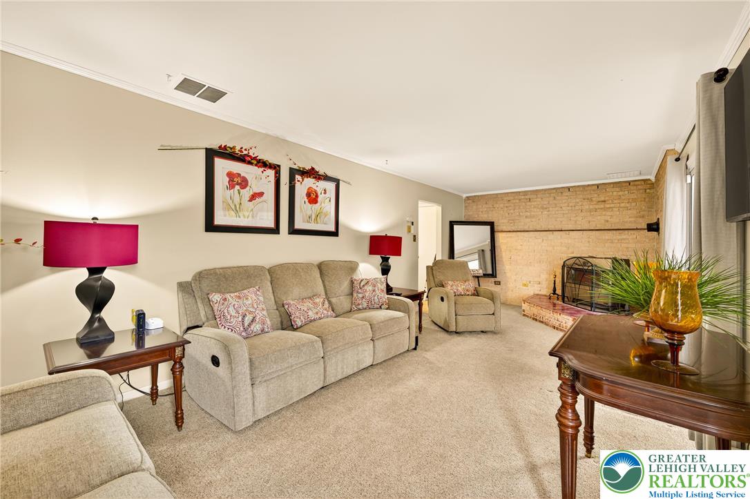 849 Weil Street Bethlehem, PA 18015 - Photo 40 of 58 a living room with furniture and a flat screen tv