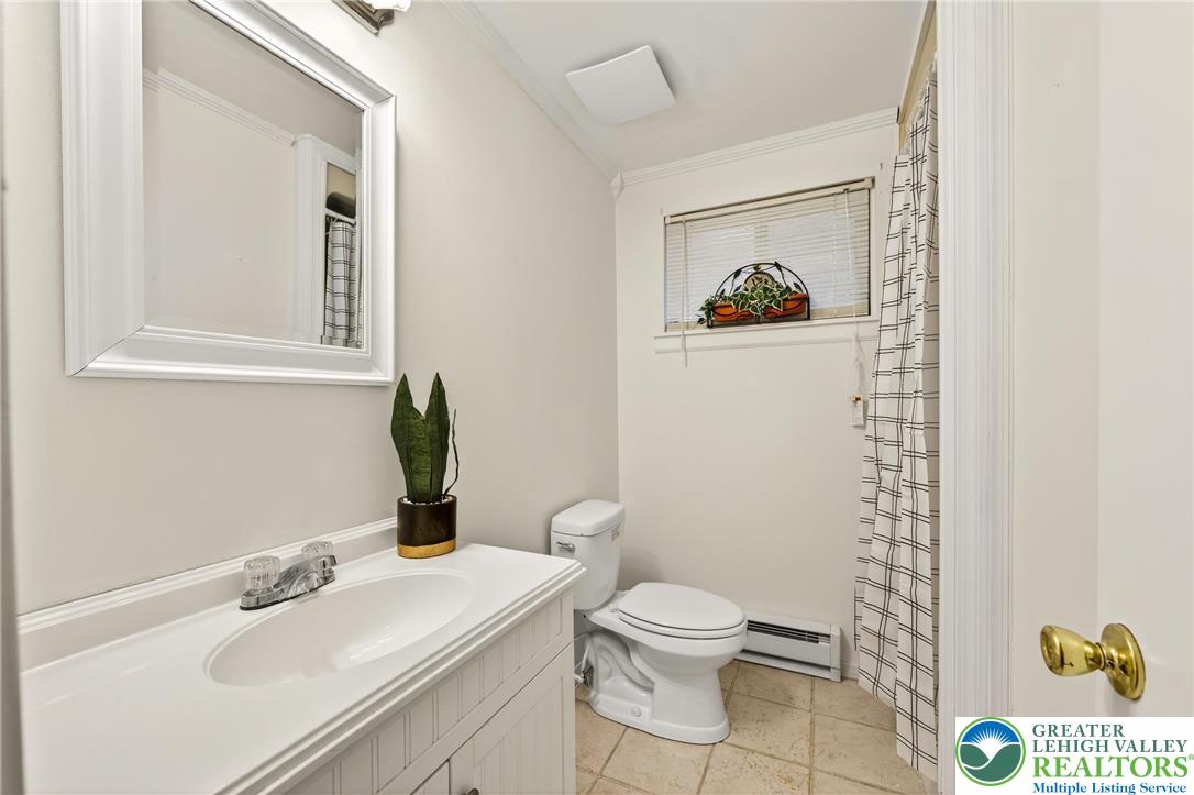 849 Weil Street Bethlehem, PA 18015 - Photo 41 of 58 a bathroom with a sink a toilet and a mirror