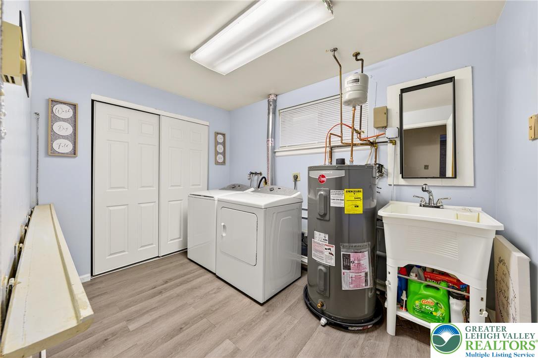 849 Weil Street Bethlehem, PA 18015 - Photo 43 of 58 a utility room with fridge dryer and washer