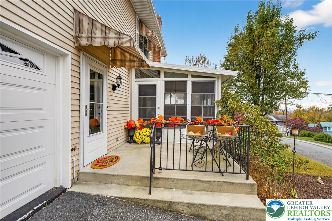 849 Weil Street Bethlehem, PA 18015 - Photo 48 of 58 a view of a house with a small yard and wooden fence