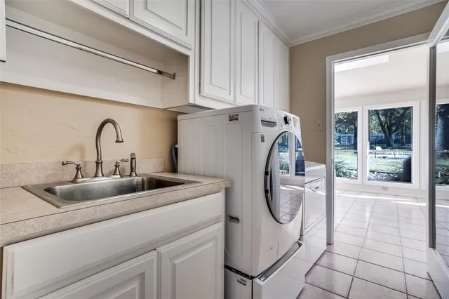 a bathroom with a sink and mirror