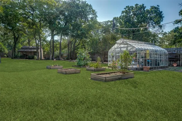 a view of a garden with a slide