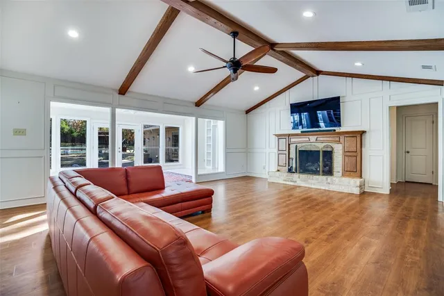 a outdoor living space with furniture and a fireplace