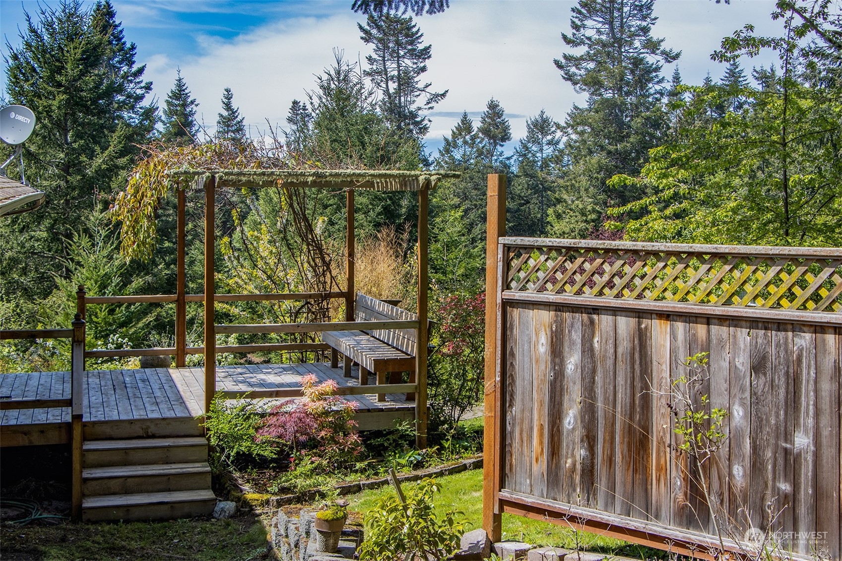 5291 Cape George Road Port Townsend, WA 98368 - Photo 14 of 25 a view of a balcony with chairs