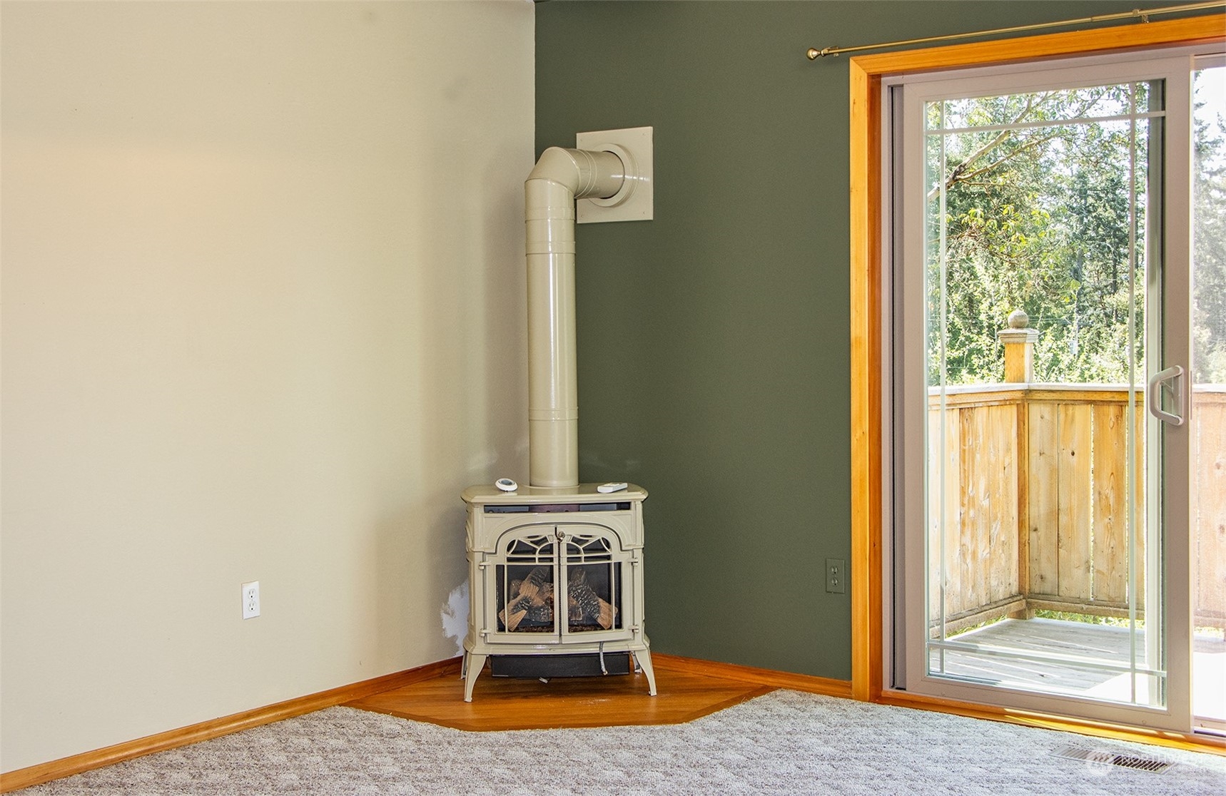 5291 Cape George Road Port Townsend, WA 98368 - Photo 16 of 25 a backyard of a house with barbeque oven