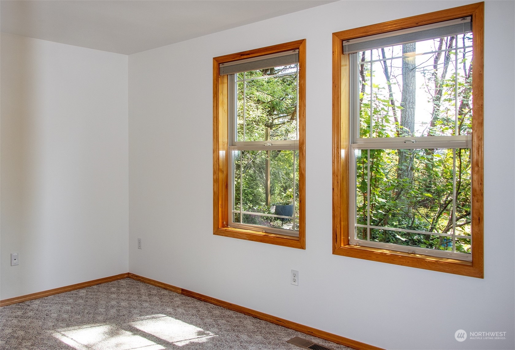 5291 Cape George Road Port Townsend, WA 98368 - Photo 18 of 25 a view of an empty room with a window