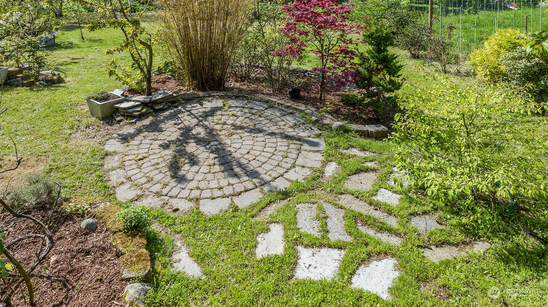 5291 Cape George Road Port Townsend, WA 98368 - Photo 19 of 25 a backyard of a house with lots of green space