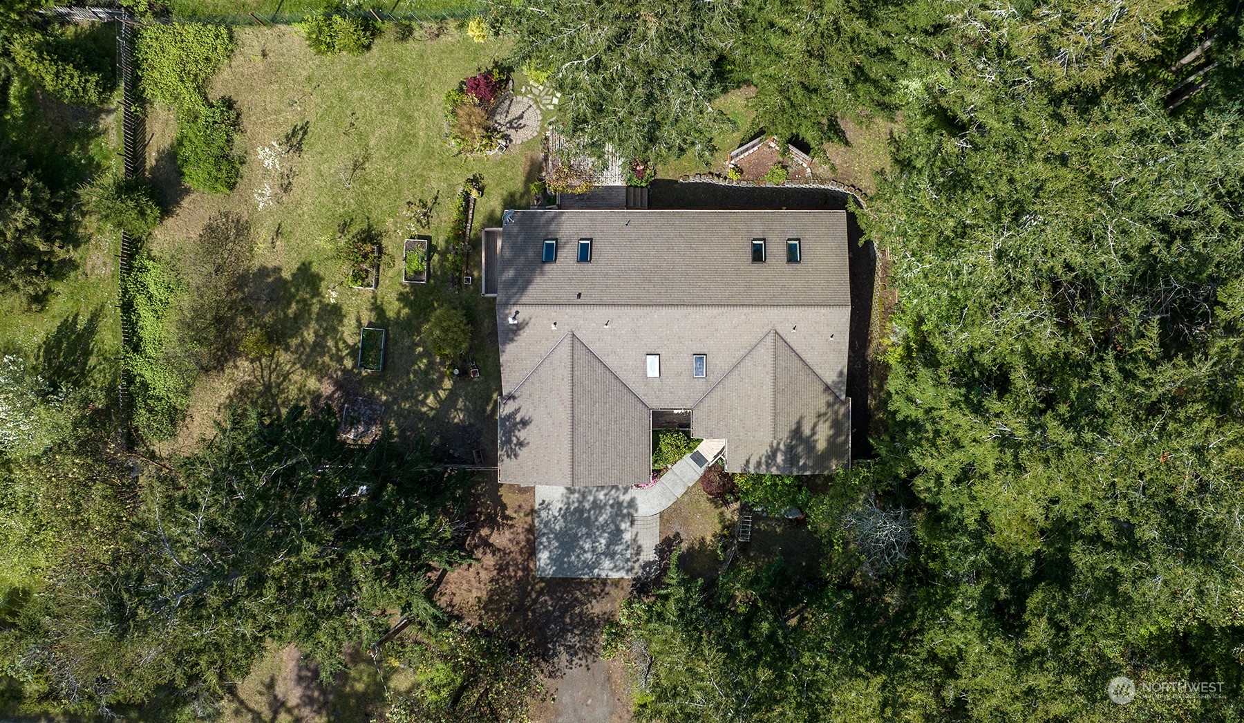 5291 Cape George Road Port Townsend, WA 98368 - Photo 6 of 25 an aerial view of a house with a yard