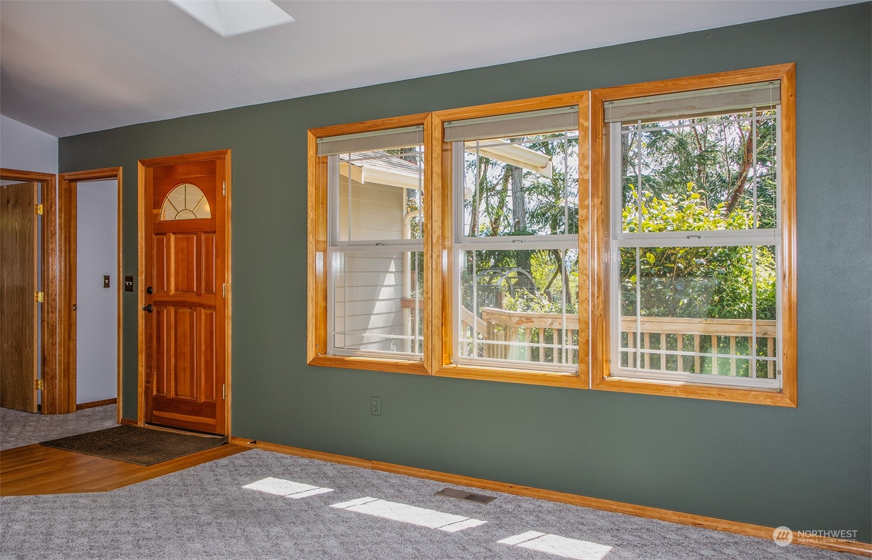 5291 Cape George Road Port Townsend, WA 98368 - Photo 7 of 25 a view of an empty room with a window