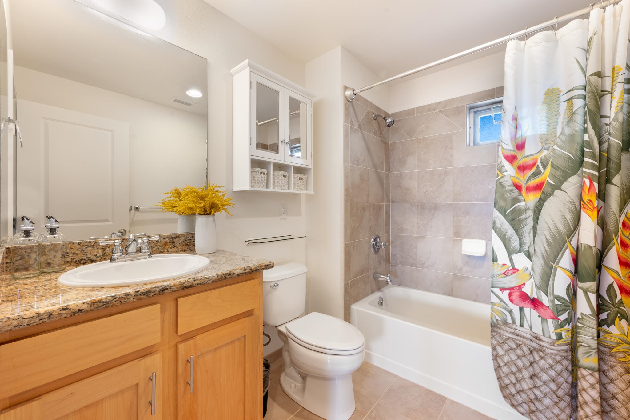 3708 Lower Honoapiilani Road, Unit E41 Lahaina, HI 96761 - Photo 23 of 42 a bathroom with a sink toilet and shower