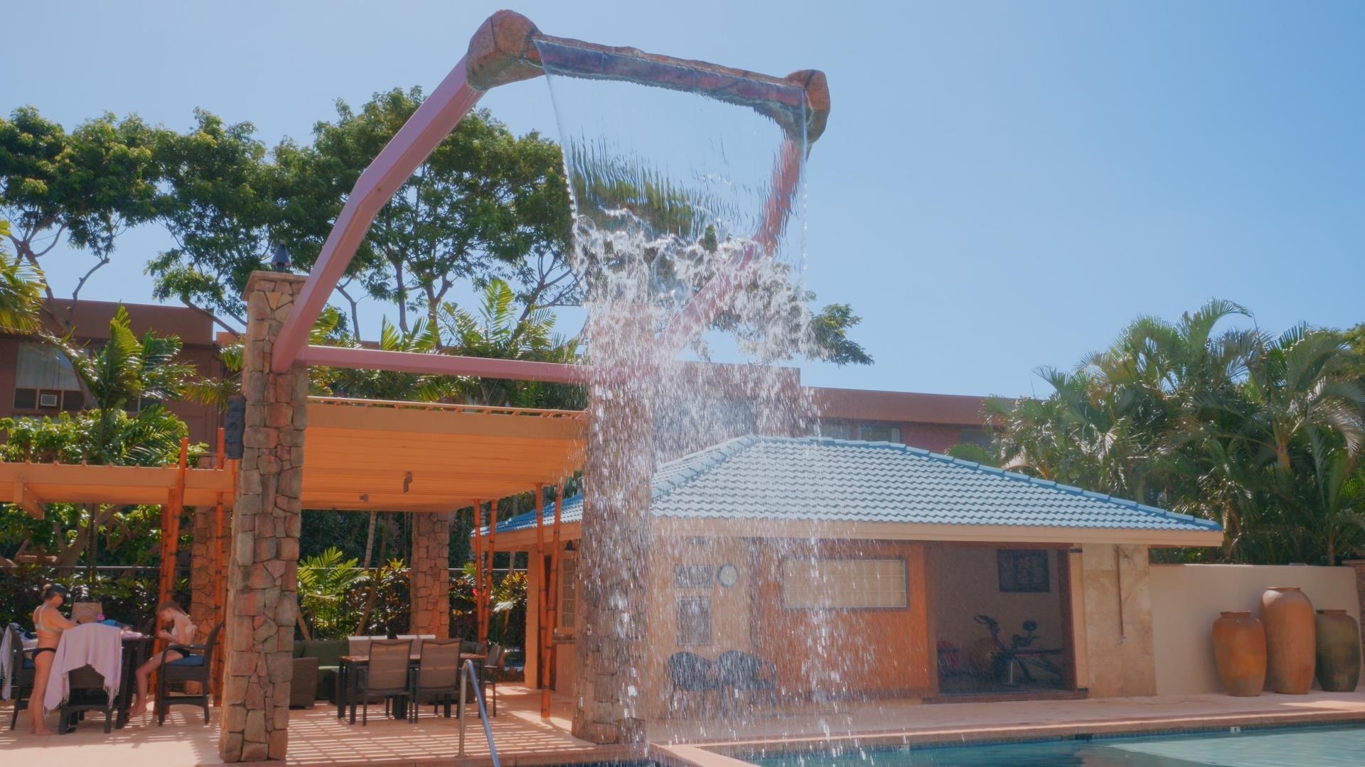 3708 Lower Honoapiilani Road, Unit E41 Lahaina, HI 96761 - Photo 38 of 42 a front view of a house with a yard