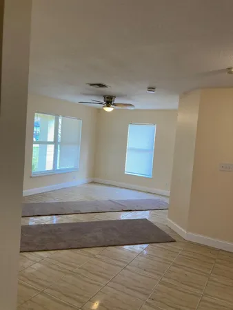 a bathroom with a bathtub and toilet