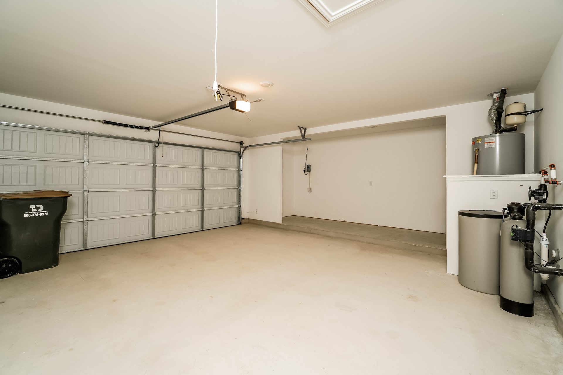 341 Madrid Kyle, TX 78640 - Photo 23 of 27 Secure parking solutions with ample storage space for a streamlined home.