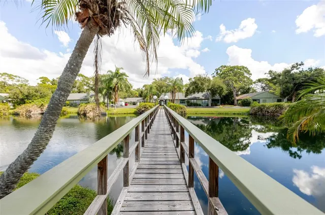 a view of balcony and yard