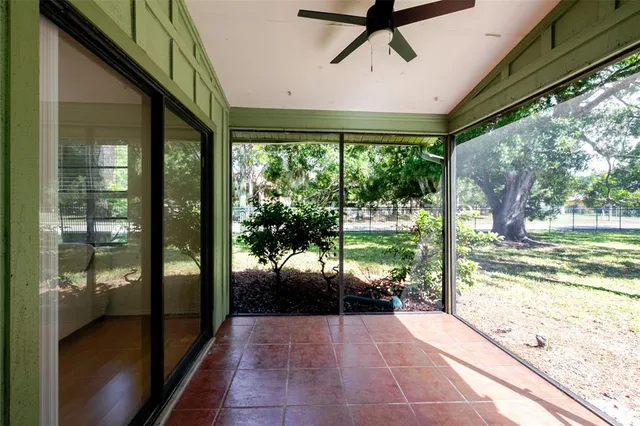 a view of a porch and garden