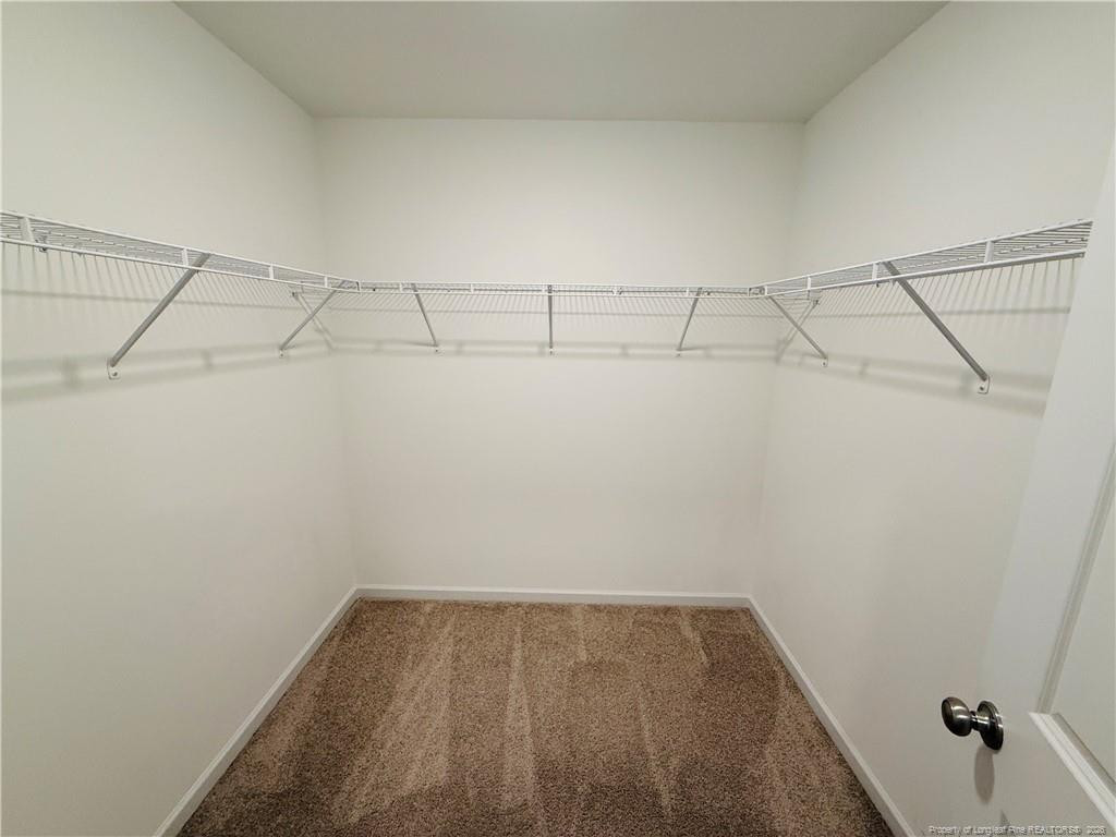 4029 Racking Horse Road Hope Mills, NC 28306 - Photo 21 of 30 a view of a room with racks on the wall