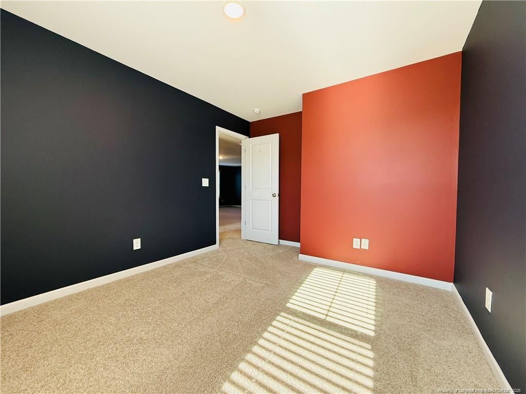 4029 Racking Horse Road Hope Mills, NC 28306 - Photo 27 of 30 a view of an empty room