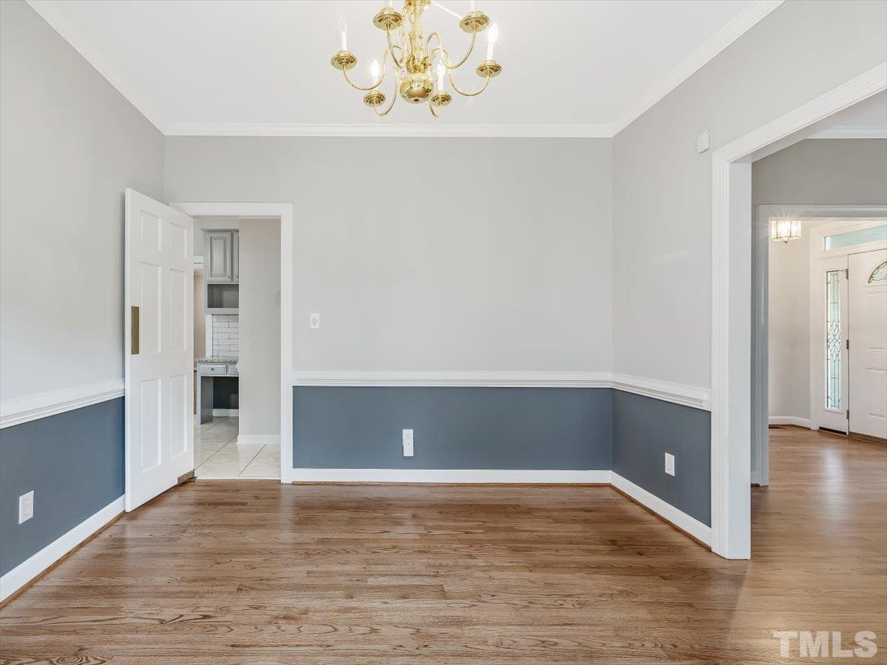4 Caspian Court Durham, NC 27713 - Photo 14 of 84 a view of an empty room with wooden floor and closet