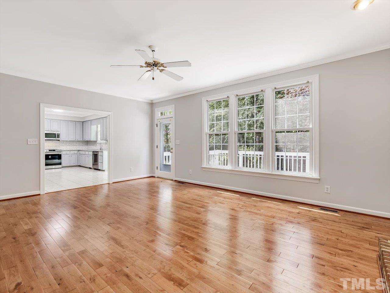 4 Caspian Court Durham, NC 27713 - Photo 23 of 84 a view of an empty room with window and wooden floor