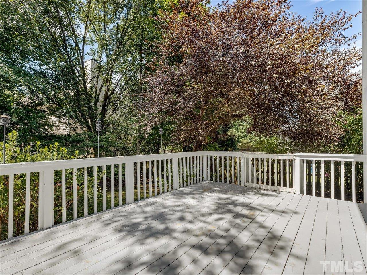 4 Caspian Court Durham, NC 27713 - Photo 25 of 84 a view of balcony with wooden floor and fence