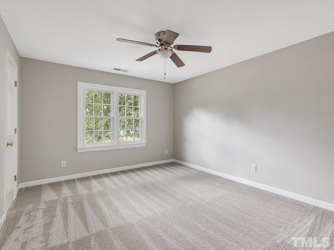 4 Caspian Court Durham, NC 27713 - Photo 42 of 84 a view of an empty room with a window