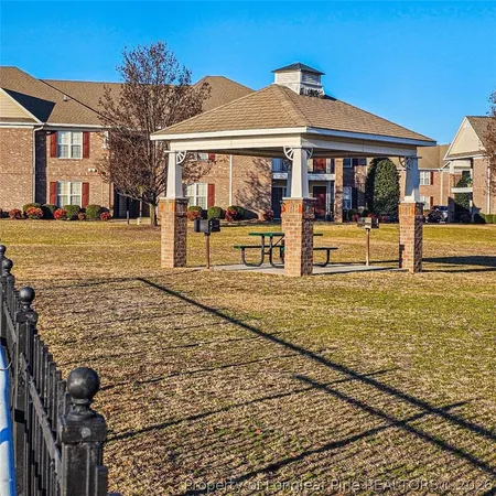 a view of a yard with an ocean