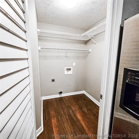 a view of storage and utility room