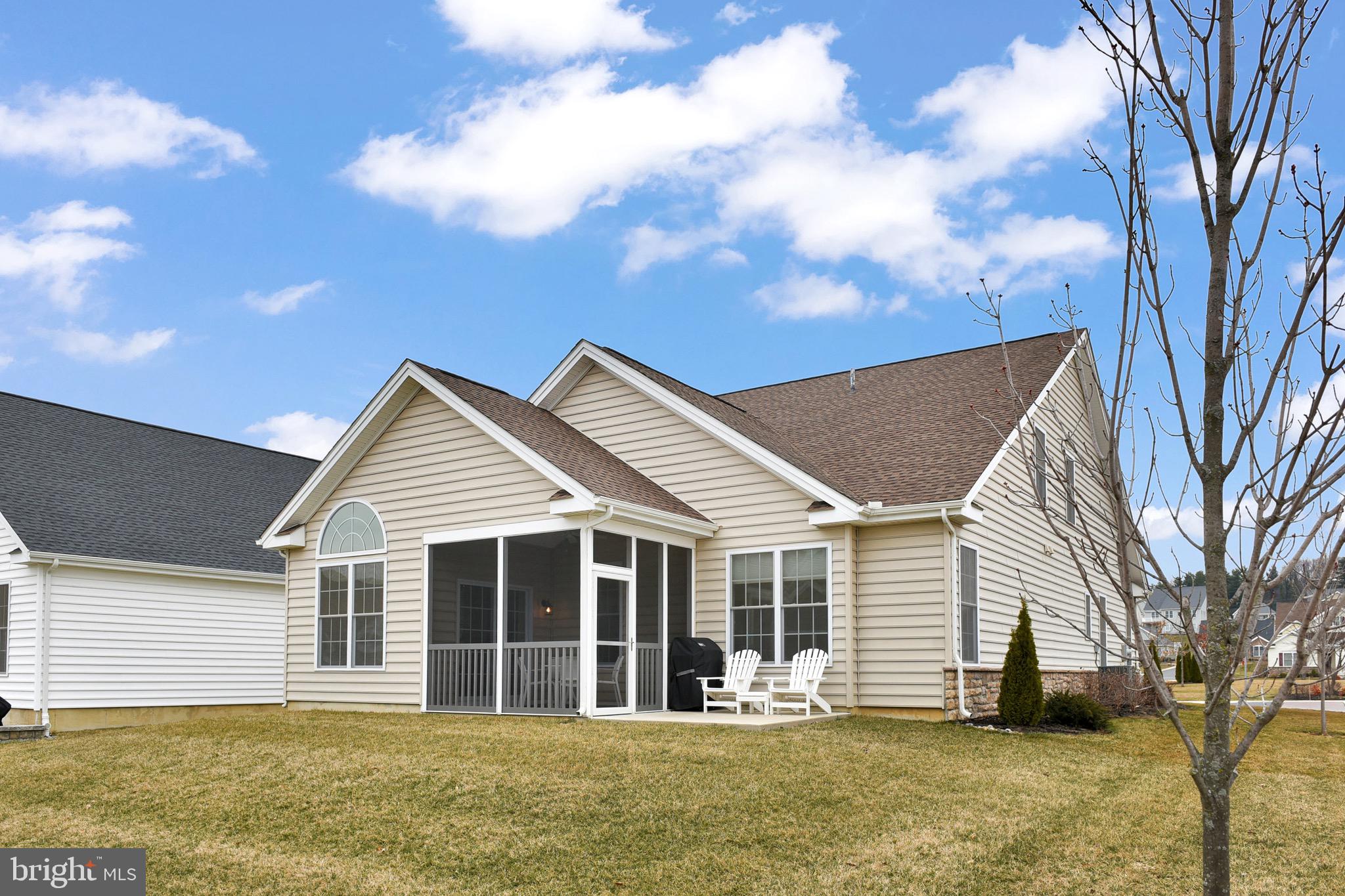 441 Patriots Way Lititz, PA 17543 - Photo 4 of 30 Rear view showing the screened in porch and patio