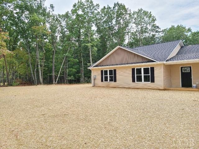 2711 Stonewall Road Concord, VA 24538 - Photo 3 of 14 a house with trees in the background