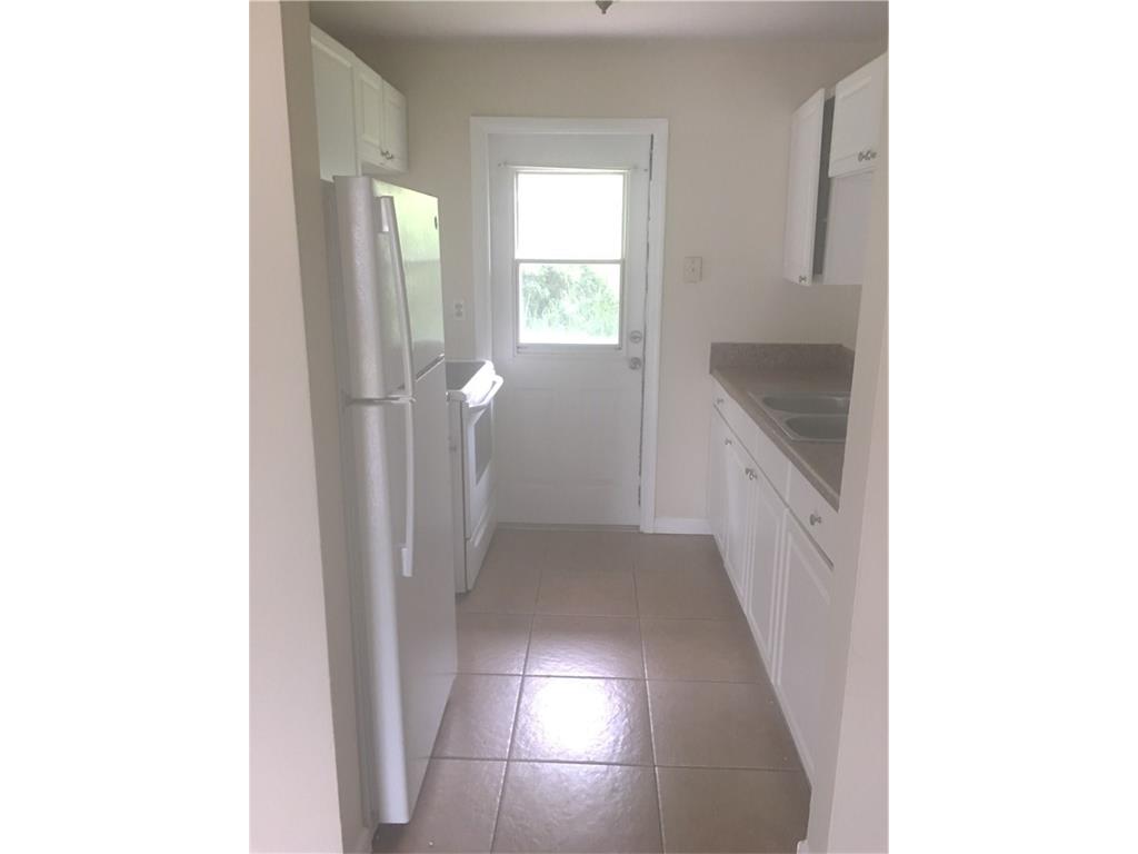 330 6th Road Southwest Vero Beach, FL 32962 - Photo 3 of 7 a view of a hallway with windows