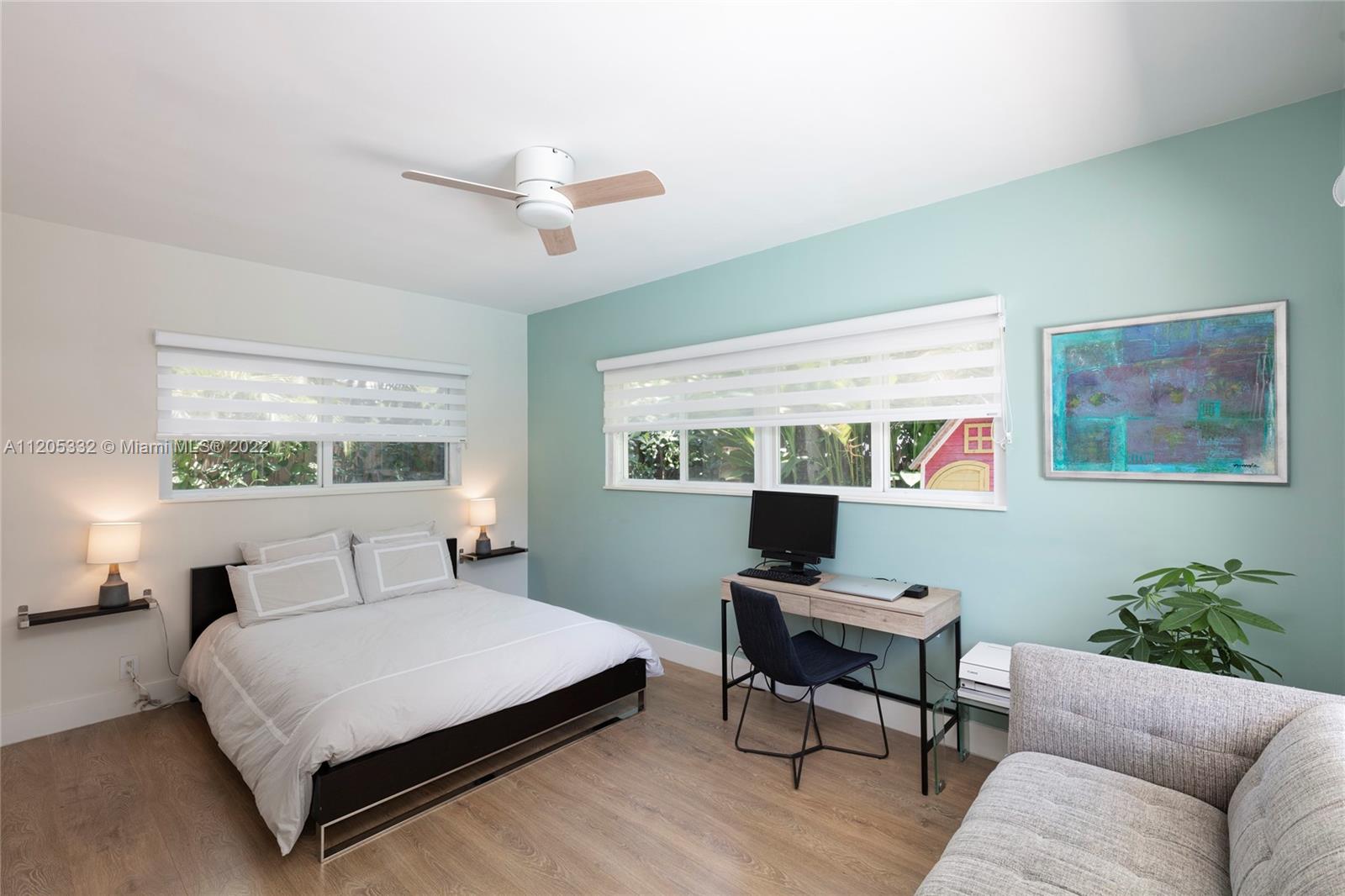 9 Pinta Road Miami, FL 33133 - Photo 16 of 25 a bedroom with a large bed and a window