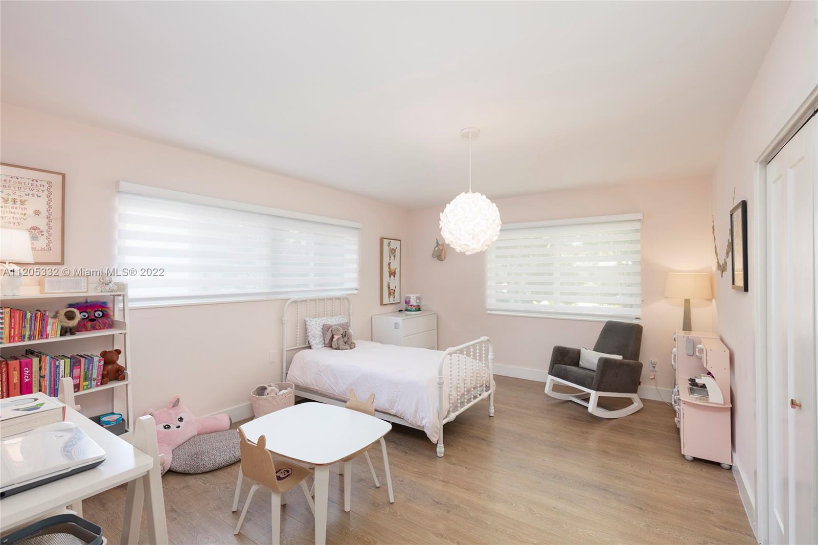 9 Pinta Road Miami, FL 33133 - Photo 20 of 25 a bedroom with furniture and a window