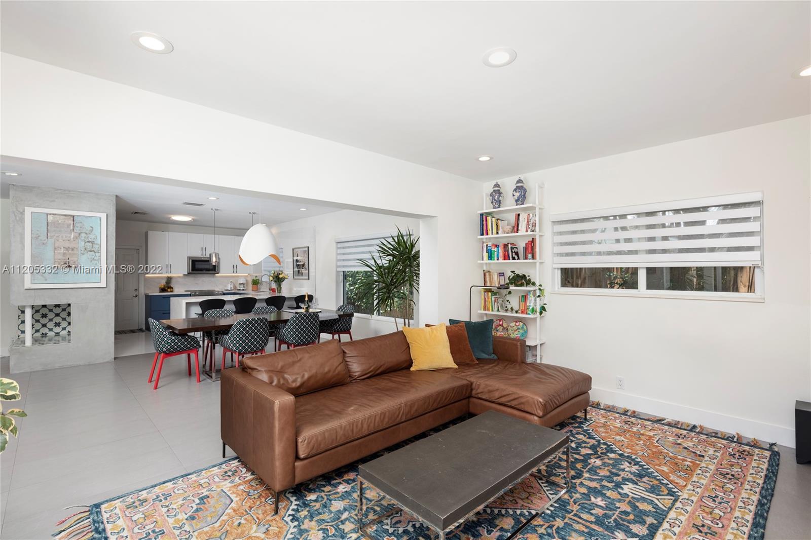 9 Pinta Road Miami, FL 33133 - Photo 8 of 25 a living room with furniture and wooden floor