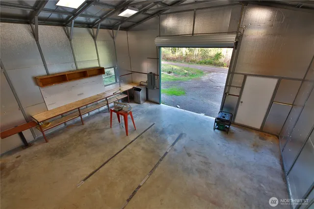 a view of a house that has a garden