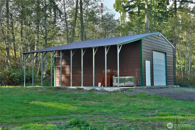 a view of a backyard with porch