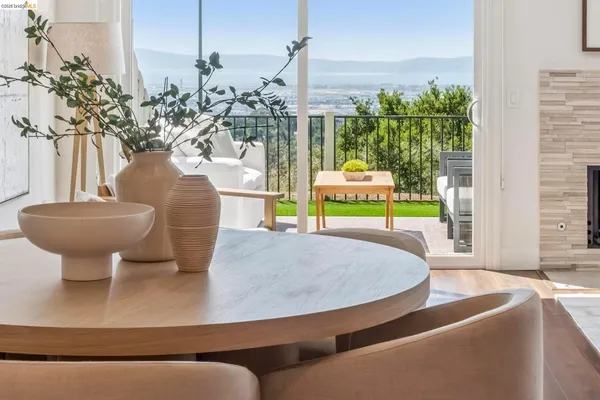a view of a living room and dining room