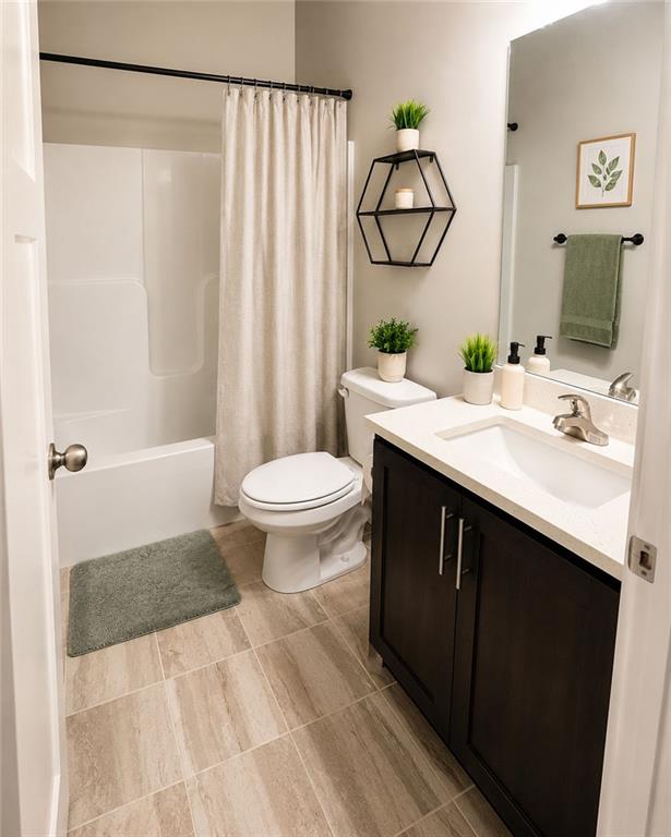 3359 Elkhorn Ridge Run Dacula, GA 30019 - Photo 14 of 35 a bathroom with a sink and a mirror