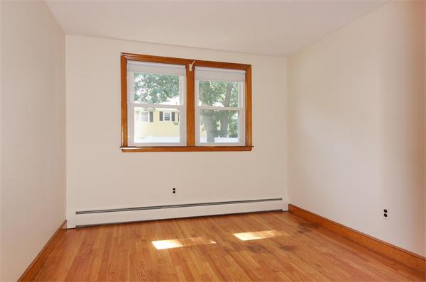 23 Jeffrey Road Arlington, MA 02474 - Photo 11 of 18 a view of a room with wooden floor and window