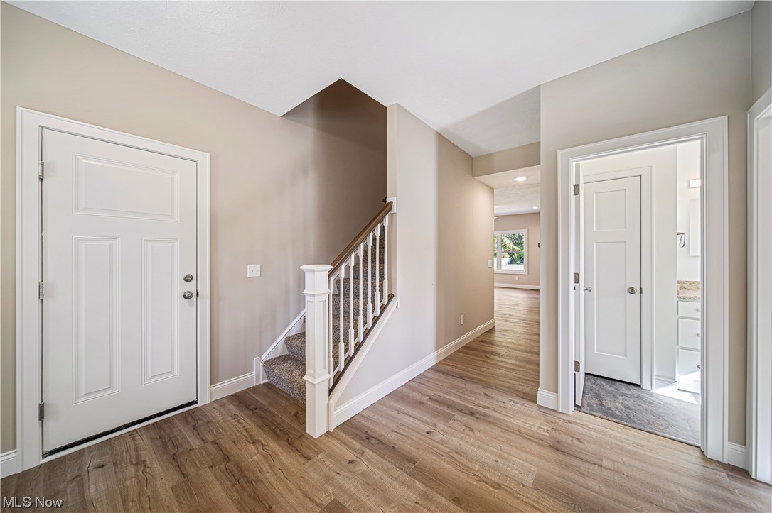 1745 Green Road Madison, OH 44057 - Photo 10 of 35 Foyer entrance with light wood-type flooring