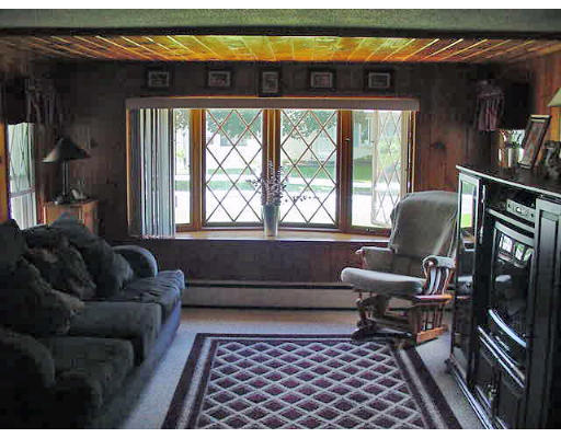 3 Alice Street Montague, MA 01376 - Photo 3 of 6 a living room with furniture and a window