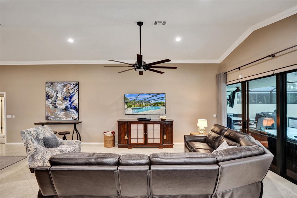 21357 Bridgeview Drive Boca Raton, FL 33428 - Photo 23 of 54 a living room with furniture and a window