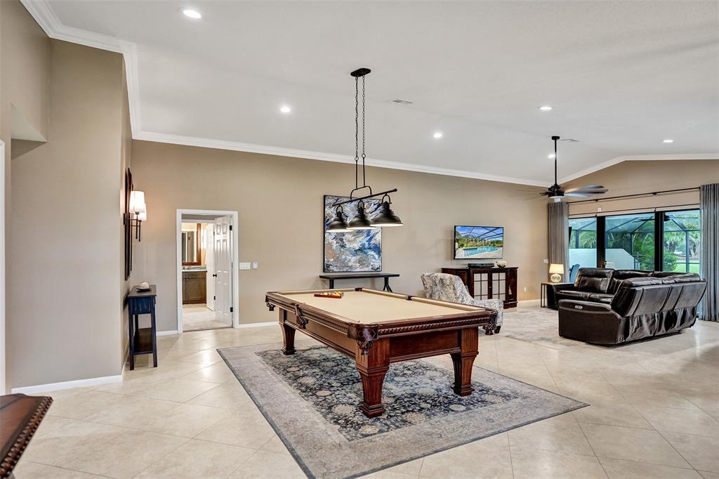 21357 Bridgeview Drive Boca Raton, FL 33428 - Photo 7 of 54 a living room with a table and chairs
