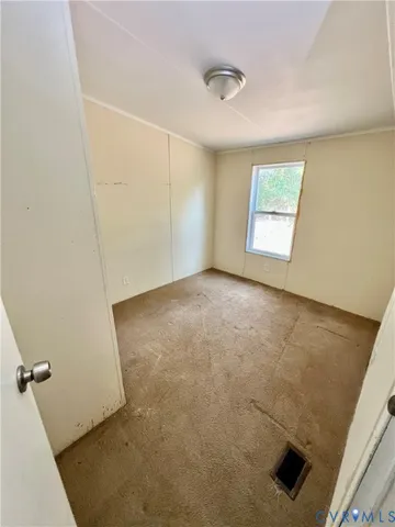 a bathroom with a sink a toilet a mirror and shower