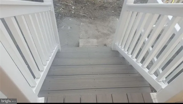 a view of a city street with tall buildings