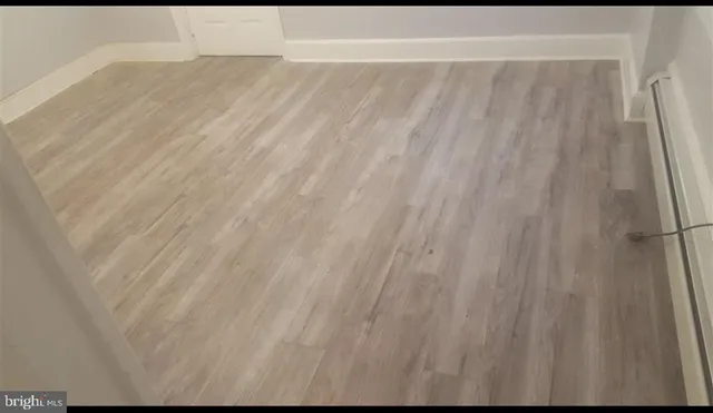 a picture of a bathroom with a shower curtain