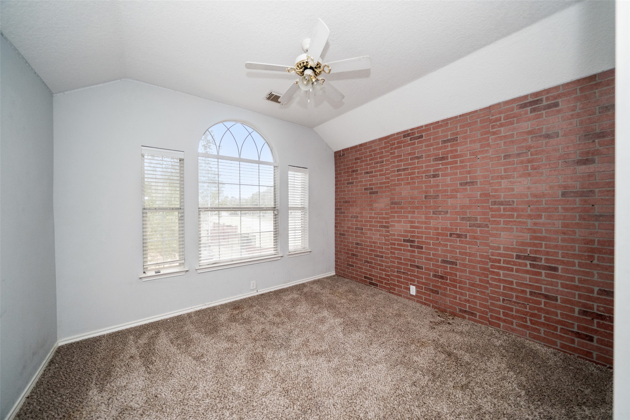 11534 Alpena Lane Houston, TX 77095 - Photo 17 of 28 a view of an empty room with a window